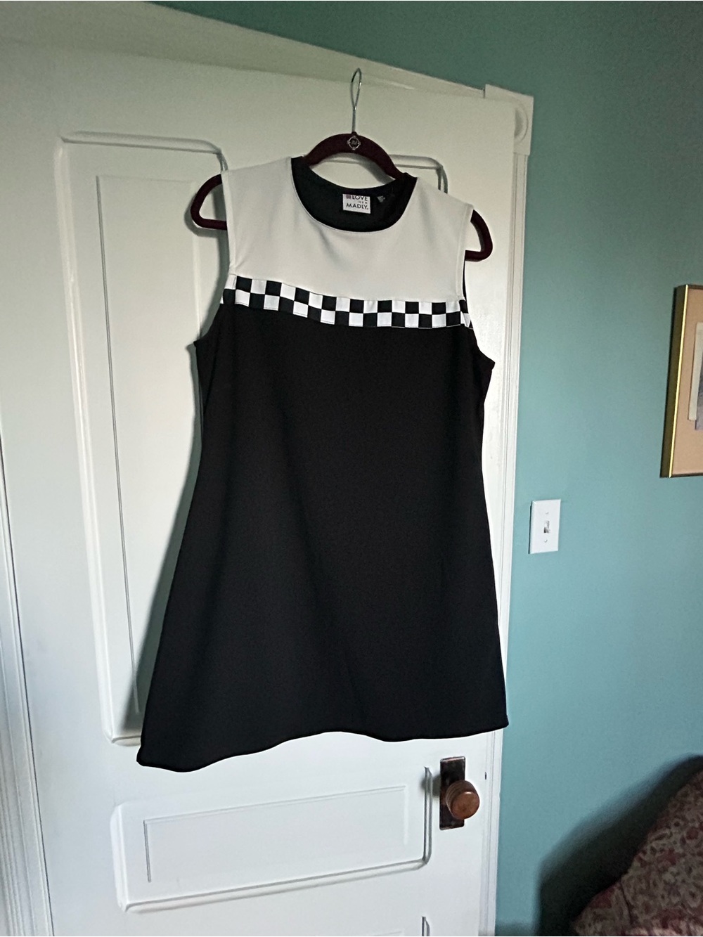 Sleeveless Black and White Mini Dress with Checkerboard Trim
